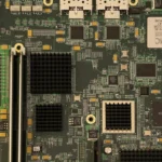 closeup photography of green and black computer motherboard