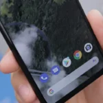 black android smartphone displaying icons